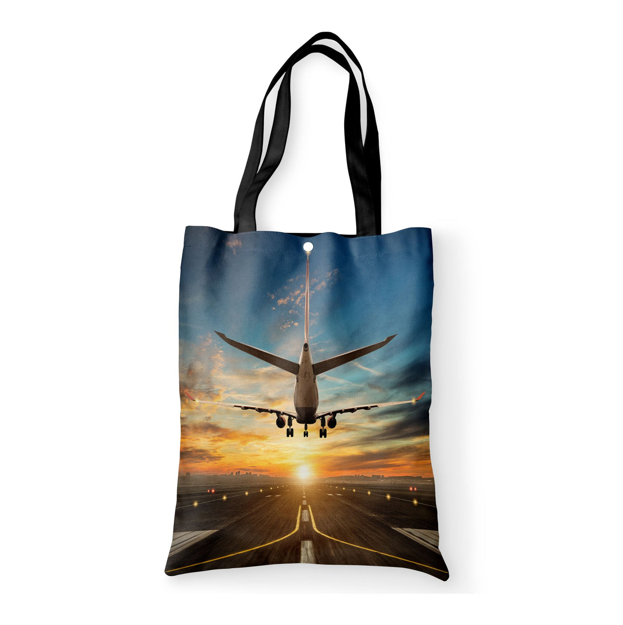 Airplane over Runway Towards the Sunrise Designed Tote Bags