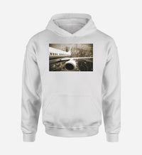 Thumbnail for Departing Aircraft & City Scene behind Designed Hoodies